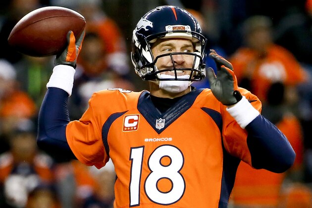 Denver Broncos quarterback Peyton Manning throws against the Indianapolis Colts during the second half of an NFL divisional playoff football game, Sunday, Jan. 11, 2015, in Denver. (AP Photo/Jack Dempsey)