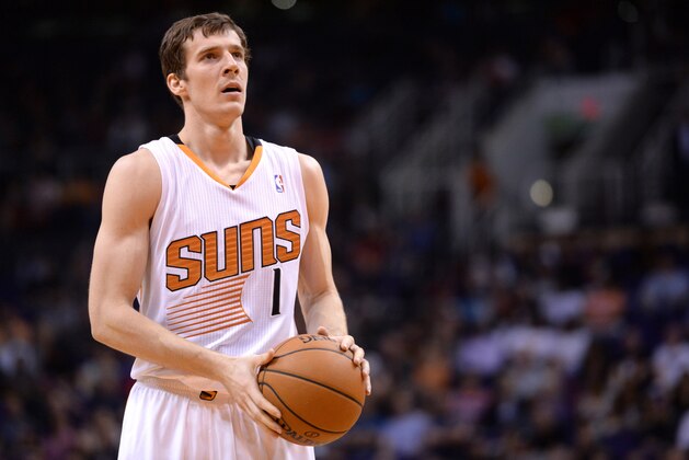 Feb 23, 2014; Phoenix, AZ, USA; Phoenix Suns shooting guard Goran Dragic (1) lines up for a free throw against the Houston Rockets during the second half at US Airways Center. The Houston Rockets won the game 115-112. Mandatory Credit: Joe Camporeale-USA TODAY Sports