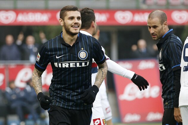 Inter Milan's Mauro Icardi, center, celebrates after scoring during the Serie A soccer match between Inter Milan and Genoa at the San Siro stadium in Milan, Italy, Sunday, Jan. 11, 2015. (AP Photo/Antonio Calanni)