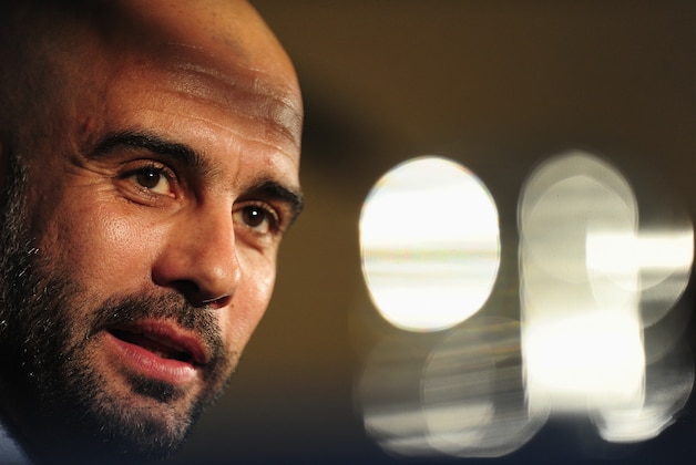 LONDON, ENGLAND - FEBRUARY 18:  FC Bayern Muenchen coach Pep Guardiola talks to the media during a press conference at the Landmark Hotel on February 18, 2014 in London, England.  (Photo by Shaun Botterill/Getty Images)