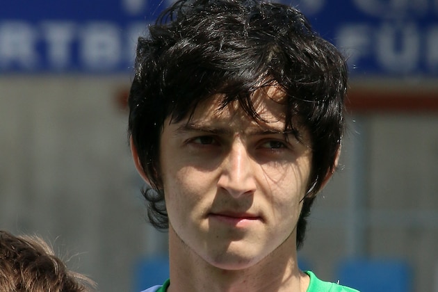 Iran's Sardar Azmoun  during a friendly soccer match between Iran and Angola, in Hartberg, Austria, Friday, May 30, 2014. (AP Photo/Ronald Zak)