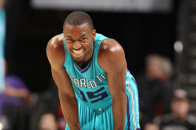 CHARLOTTE, NC - JANUARY 14: Kemba Walker #15 of the Charlotte Hornets during the game against the San Antonio Spurs at the Time Warner Cable Arena on January 14, 2015 in Charlotte, North Carolina. NOTE TO USER: User expressly acknowledges and agrees that, by downloading and or using this photograph, User is consenting to the terms and conditions of the Getty Images License Agreement.  Mandatory Copyright Notice:  Copyright 2015 NBAE (Photo by Kent Smith/NBAE via Getty Images)