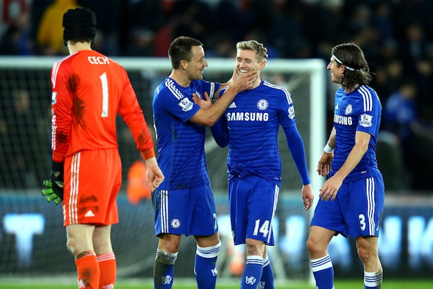 SWANSEA, WALES - JANUARY 17:  Andre Schurrle of Chelsea is congratulated by John Terry of Chelsea after scoring the team's fifth goal during the Barclays Premier League match between Swansea City and Chelsea at Liberty Stadium on January 17, 2015 in Swansea, Wales.  (Photo by Richard Heathcote/Getty Images)