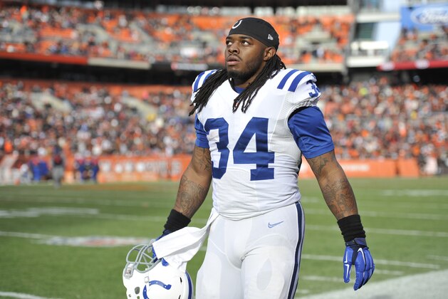 Indianapolis Colts running back Trent Richardson walks off the field at halftime of an NFL football game against the Cleveland Browns Sunday, Dec. 7, 2014, in Cleveland. The Colts won 25-24. (AP Photo/David Richard)