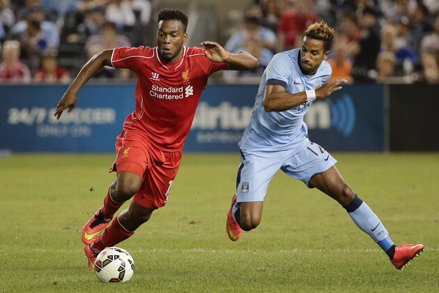 Liverpool forward Daniel Sturridge (15) challenges Manchester City midfielder Scott Sinclair (12) in the second half of a Guinness International Champions Cup soccer tournament match, Wednesday, July 30, 2014, at Yankee Stadium in New York. Liverpool won on 3-2 on a penalty kick shootout. (AP Photo/Julie Jacobson) Liverpool forward Daniel Sturridge (15) challenges Manchester City midfielder Scott Sinclair (12) in the second half of a Guinness International Champions Cup soccer tournament match, Wednesday, July 30, 2014, at Yankee Stadium in New York. Liverpool won on 3-2 on a penalty kick shootout. (AP Photo/Julie Jacobson)