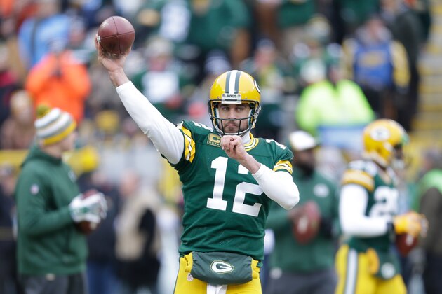 GREEN BAY, WI - JANUARY 11:  Quarterback Aaron Rodgers #12 of the Green Bay Packers warms up prior to the 2015 NFC Divisional Playoff game against the Dallas Cowboys at Lambeau Field on January 11, 2015 in Green Bay, Wisconsin.  (Photo by Mike McGinnis/Getty Images)