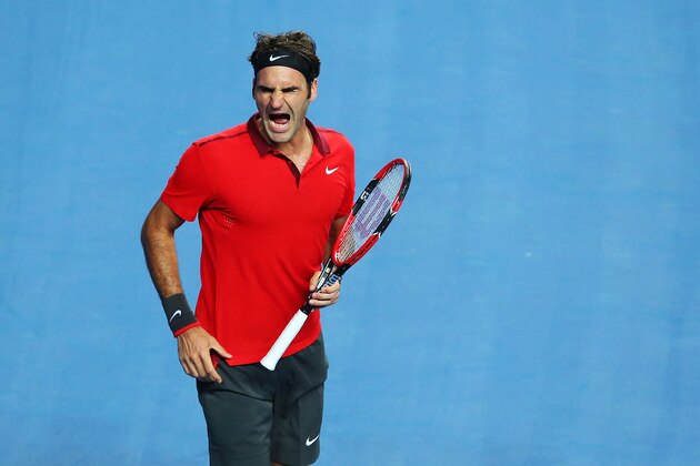 SYDNEY, AUSTRALIA - JANUARY 12:  Roger Federer of Switzerland reacts after winning a point against Lleyton Hewitt of Australia during their match at Qantas Credit Union Arena on January 12, 2015 in Sydney, Australia.  (Photo by Brendon Thorne/Getty Images)