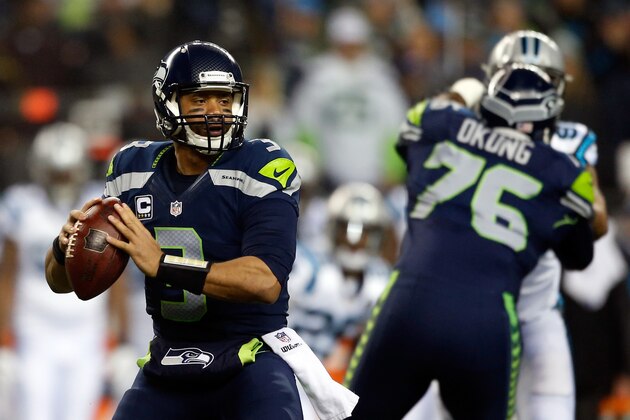 SEATTLE, WA - JANUARY 10:  Russell Wilson #3 of the Seattle Seahawks in action against the Carolina Panthers during the 2015 NFC Divisional Playoff game at CenturyLink Field on January 10, 2015 in Seattle, Washington.  (Photo by Otto Greule Jr/Getty Images)