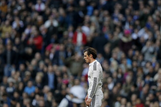 Real Madrid's Gareth Bale  reacts during a Spanish La Liga soccer match between Real Madrid and Espanyol at the Santiago Bernabeu stadium  in Madrid, Spain, Saturday, Jan. 10, 2015.  (AP Photo/Daniel Ochoa de Olza)