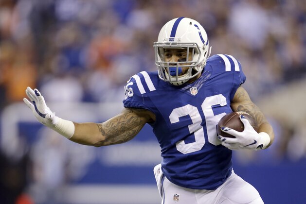 Indianapolis Colts running back Daniel Herron runs with the ball during the first half of an NFL wildcard playoff football game against the Cincinnati Bengals Sunday, Jan. 4, 2015, in Indianapolis. (AP Photo/AJ Mast)