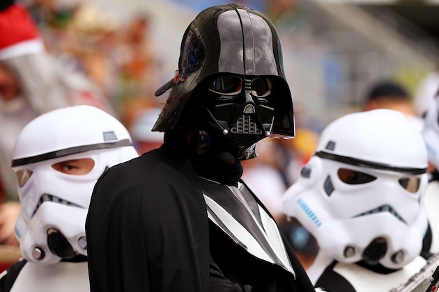 GOLD COAST, AUSTRALIA - NOVEMBER 26: Fans dressed as Star Wars Imperial Troopers and Darth Vader pose for a photo during day two of the Gold Coast Sevens World Series at Skilled Park on November 26, 2011 in Gold Coast, Australia.  (Photo by Mark Nolan/Getty Images)