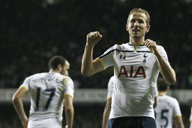 Tottenham’s Harry Kane celebrates after scoring his side's third goal during their English League Cup soccer quarterfinal match between Tottenham Hotspur and Newcastle United at White Hart Lane stadium in London Wednesday, Dec. 17, 2014. (AP Photo/Alastair Grant)