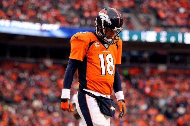 DENVER, CO - JANUARY 11:  Peyton Manning #18 of the Denver Broncos looks on against the Indianapolis Colts during a 2015 AFC Divisional Playoff game at Sports Authority Field at Mile High on January 11, 2015 in Denver, Colorado.  (Photo by Ezra Shaw/Getty Images)