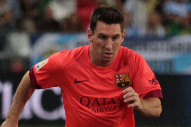 MALAGA, SPAIN - SEPTEMBER 24:  Lionel Messi of F.C. Barcelona controls the ball during the La Liga match between Malaga CF and FC Barcelona at La Rosaleda studium on September 24, 2014 in Malaga, Spain. (Photo by Sergio Camacho/Getty Images)