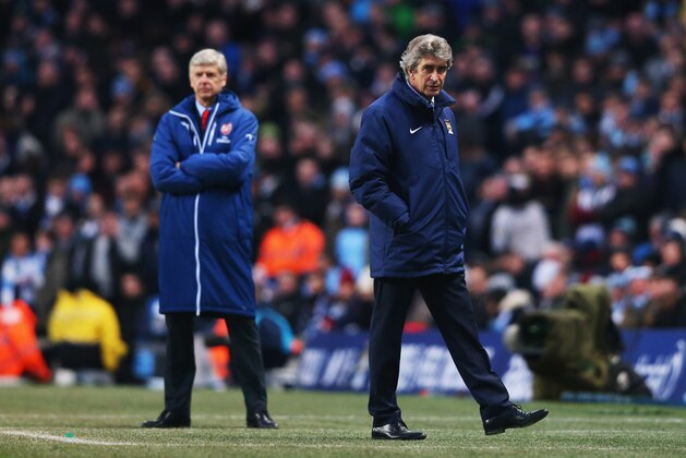 MANCHESTER, ENGLAND - JANUARY 18:  Manuel Pellegrini manager of Manchester City and Arsene Wenger manager of Arsenal look on from the touchline during the Barclays Premier League match between Manchester City and Arsenal at Etihad Stadium on January 18, 2015 in Manchester, England.  (Photo by Alex Livesey/Getty Images)