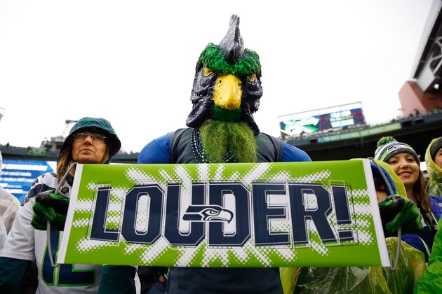 SEATTLE, WA - JANUARY 18:  Seattle Seahawks fans get ready for the start of the 2015 NFC Championship game against the Green Bay Packers at CenturyLink Field on January 18, 2015 in Seattle, Washington.  (Photo by Tom Pennington/Getty Images)