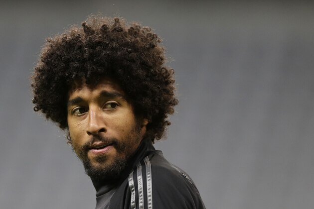 Bayern's Dante from Brazil attends a training session prior to the Champions League Group E soccer match between FC Bayern Munich and AS Roma at Allianz Arena in Munich, southern Germany, Tuesday Nov. 4, 2014. Bayern Munich will face Roma on Wednesday. (AP Photo/Matthias Schrader)