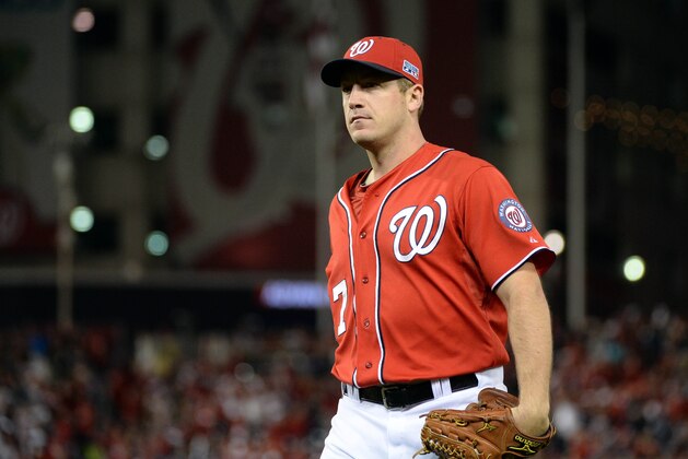 Oct 4, 2014; Washington, DC, USA; Washington Nationals starting pitcher Jordan Zimmermann (27) walks to the dugout after pitching in the seventh inning against the San Francisco Giants in game two of the 2014 NLDS playoff baseball game at Nationals Park. Mandatory Credit: H. Darr Beiser-USA TODAY Sports