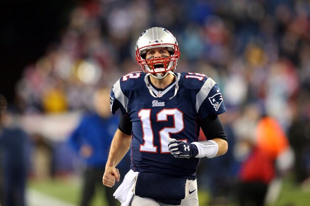 FOXBORO, MA - JANUARY 18:  Tom Brady #12 of the New England Patriots warms up before the 2015 AFC Championship Game against the Indianapolis Colts at Gillette Stadium on January 18, 2015 in Foxboro, Massachusetts.  (Photo by Jim Rogash/Getty Images)