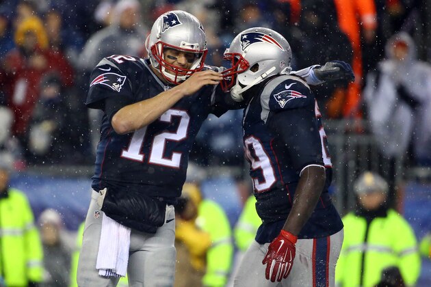 FOXBORO, MA - JANUARY 18:  Tom Brady #12 of the New England Patriots celebrates with  LeGarrette Blount #29 after Blount's touchdown in the fourth quarter against the Indianapolis Colts of the 2015 AFC Championship Game at Gillette Stadium on January 18, 2015 in Foxboro, Massachusetts.  (Photo by Al Bello/Getty Images)