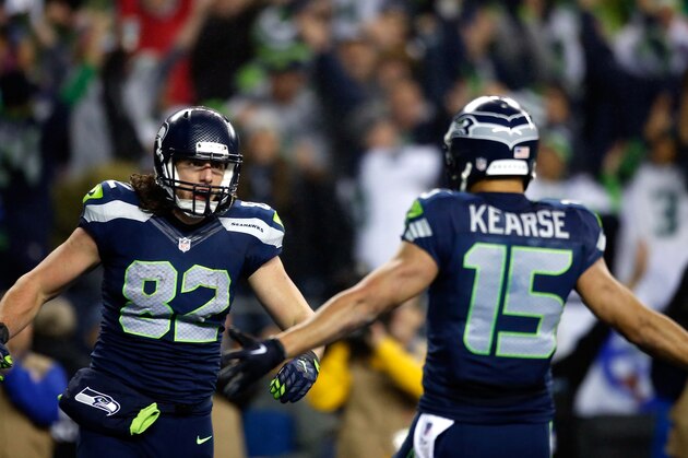 SEATTLE, WA - JANUARY 10:  Luke Willson #82 of the Seattle Seahawks celebrates with Jermaine Kearse #15 after scoring a 25 yard touchdown in the fourth quarter against the Carolina Panthers during the 2015 NFC Divisional Playoff game at CenturyLink Field on January 10, 2015 in Seattle, Washington.  (Photo by Otto Greule Jr/Getty Images)