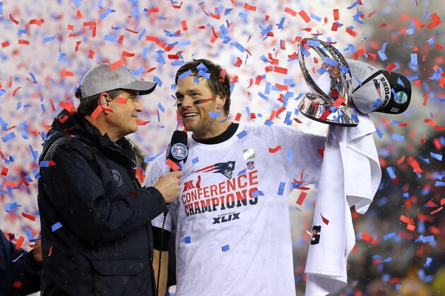 FOXBORO, MA - JANUARY 18:  Tom Brady #12 of the New England Patriots holds up the Lamar Hunt Trophy after defeating the Indianapolis Colts in the 2015 AFC Championship Game at Gillette Stadium on January 18, 2015 in Foxboro, Massachusetts.  The Patriots defeated the Colts 45-7.  (Photo by Maddie Meyer/Getty Images)
