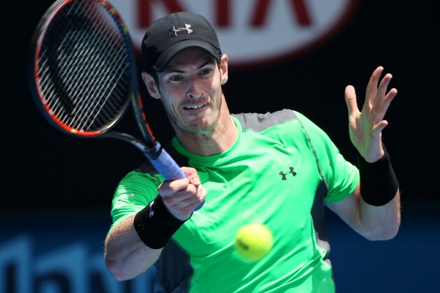 Andy Murray of Britain makes a forehand return to Yuki Bhambri of India during their first round match at the Australian Open tennis championship in Melbourne, Australia, Monday, Jan. 19, 2015. (AP Photo/Rob Griffith)