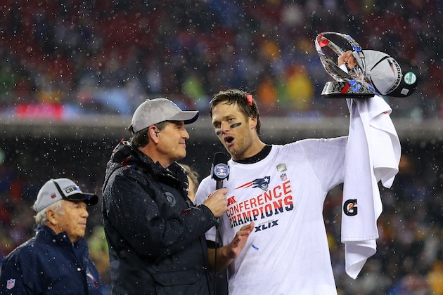 FOXBORO, MA - JANUARY 18:  Tom Brady #12 of the New England Patriots holds up the Lamar Hunt Trophy after defeating the Indianapolis Colts in the 2015 AFC Championship Game at Gillette Stadium on January 18, 2015 in Foxboro, Massachusetts.  The Patriots defeated the Colts 45-7.  (Photo by Maddie Meyer/Getty Images)
