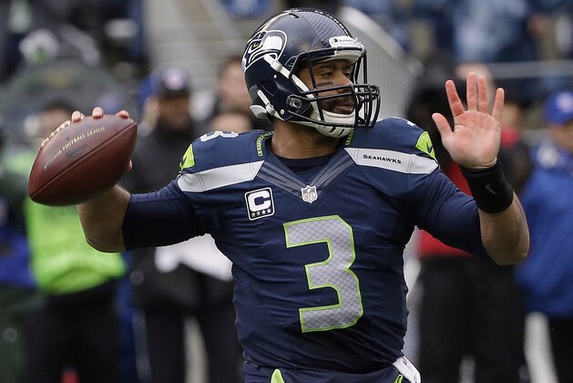 Seattle Seahawks' Russell Wilson prepares to throw during the first half of the NFL football NFC Championship game against the Green Bay Packers Sunday, Jan. 18, 2015, in Seattle. (AP Photo/David J. Phillip) Seattle Seahawks' Russell Wilson prepares to throw during the first half of the NFL football NFC Championship game against the Green Bay Packers Sunday, Jan. 18, 2015, in Seattle. (AP Photo/David J. Phillip)
