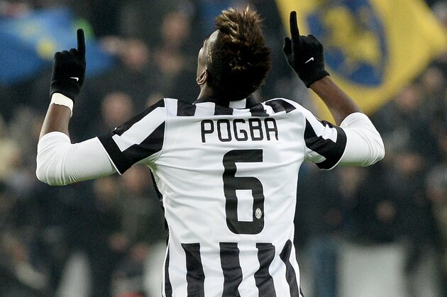 Juventus' Paul Pogba celebrates after scoring during a Serie A soccer match between Juventus and Hellas Verona at the Juventus stadium in Turin, Italy, Sunday, Jan. 18, 2015. (AP Photo/Massimo Pinca)