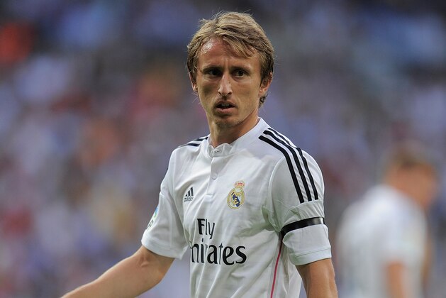 MADRID, SPAIN - SEPTEMBER 13: Luka Modric of Real Madrid looks on during the La Liga match between Real Madrid and Atletico de Madrid at Estadio Santiago Bernabeu on September 13, 2014 in Madrid, Spain.  (Photo by Denis Doyle/Getty Images)