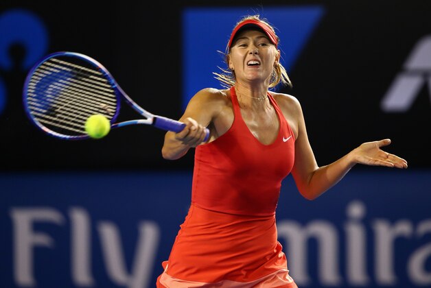MELBOURNE, AUSTRALIA - JANUARY 19:  Maria Sharapova of Russia plays a forehand in her first round match against Petra Martic of Croatia during day one of the 2015 Australian Open at Melbourne Park on January 19, 2015 in Melbourne, Australia.  (Photo by Clive Brunskill/Getty Images)