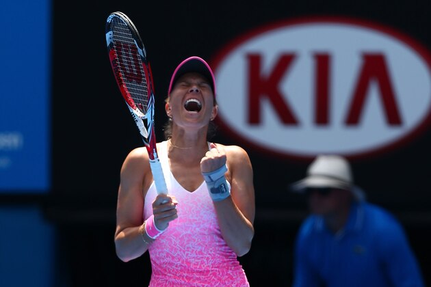 MELBOURNE, AUSTRALIA - JANUARY 19:  Lucie Hradecka of the Czech Republic celebrates winning in her first round match against Ana Ivanovic of Serbia during day one of the 2015 Australian Open at Melbourne Park on January 19, 2015 in Melbourne, Australia.  (Photo by Clive Brunskill/Getty Images)