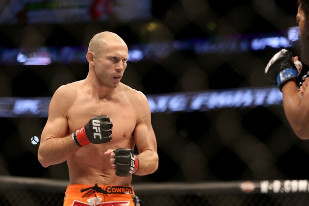 Donald 'Cowboy' Cerrone in action against Benson Henderson during their lightweight fight at UFC Fight Night Boston, Sunday, January 18, 2015 in Boston.  Cerrone won via unanimous decision. (AP Photo/Gregory Payan)