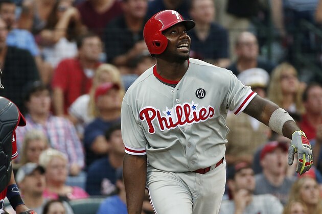 Philadelphia Phillies first baseman Ryan Howard (6) bats against the Atlanta Braves in a baseball game  in Atlanta, Saturday, July 19, 2014.(AP Photo/John Bazemore)