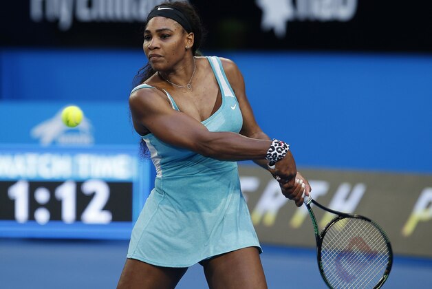 Serena Williams of the U.S plays a backhand shot against Agnieszka Radwanska of Poland during the women's singles final at the Hopman Cup tennis tournament in Perth, Australia, Saturday, Jan. 10, 2015. (AP Photo/Theron Kirkman)