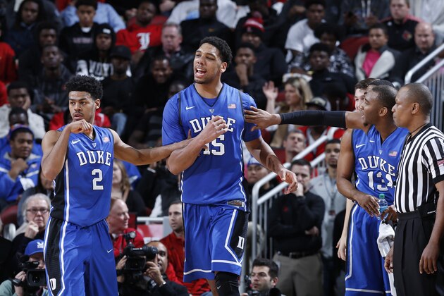 LOUISVILLE, KY - JANUARY 17: Jahlil Okafor #15 of the Duke Blue Devils celebrates with teammate Quinn Cook #2 after making a basket against the Louisville during the game at KFC Yum! Center on January 17, 2015 in Louisville, Kentucky. Duke defeated Louisville 63-52. (Photo by Joe Robbins/Getty Images)
