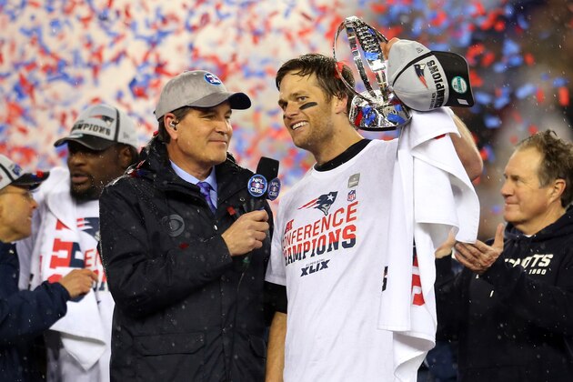 FOXBORO, MA - JANUARY 18:  Tom Brady #12 of the New England Patriots holds up the Lamar Hunt Trophy after defeating the Indianapolis Colts in the 2015 AFC Championship Game at Gillette Stadium on January 18, 2015 in Foxboro, Massachusetts.  The Patriots defeated the Colts 45-7.  (Photo by Jim Rogash/Getty Images)