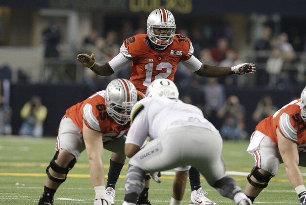 Ohio State quarterback Cardale Jones (12) calls a play during the second half of the NCAA college football playoff championship game against Oregon Monday, Jan. 12, 2015, in Arlington, Texas. (AP Photo/LM Otero)