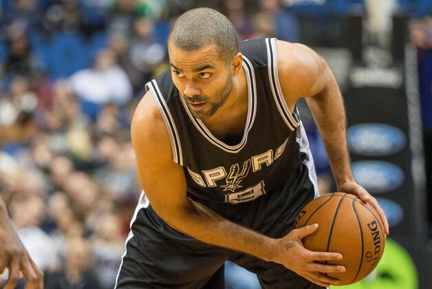 Jan 10, 2015; Minneapolis, MN, USA; San Antonio Spurs guard Tony Parker (9) looks on with the ball in the second half against the Minnesota Timberwolves at Target Center. The Spurs won 108-93. Mandatory Credit: Jesse Johnson-USA TODAY Sports