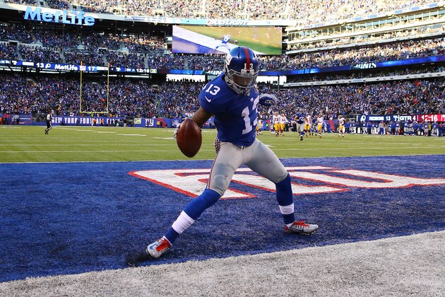 EAST RUTHERFORD, NJ - DECEMBER 14:  Odell Beckham Jr. #13 of the New York Giants celebrates after an attempted 30 yard touchdown that was nullified due to a penalty in the fourth quarter during their game against the Washington Redskins at MetLife Stadium on December 14, 2014 in East Rutherford, New Jersey.  (Photo by Al Bello/Getty Images)