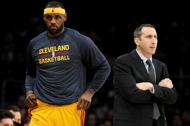 LOS ANGELES, CA - JANUARY 15:  LeBron James #23 of the Cleveland Cavaliers returns to the court behind Head Coach David Blatt of the Cleveland Cavaliers during a 109-102 win over the Los Angeles Lakers at Staples Center on January 15, 2015 in Los Angeles, California.  NOTE TO USER: User expressly acknowledges and agrees that, by downloading and or using this Photograph, user is consenting to the terms and condition of the Getty Images License Agreement.  (Photo by Harry How/Getty Images)