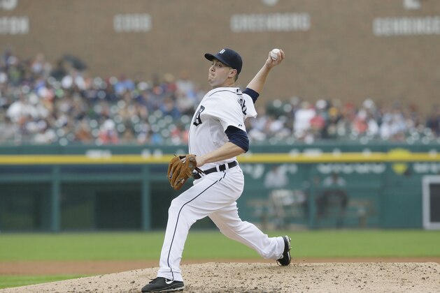 Detroit Tigers relief pitcher Corey Knebel throws during the eighth inning in the first baseball game of a doubleheader against the Cleveland Indians, Saturday, July 19, 2014 in Detroit. (AP Photo/Carlos Osorio)