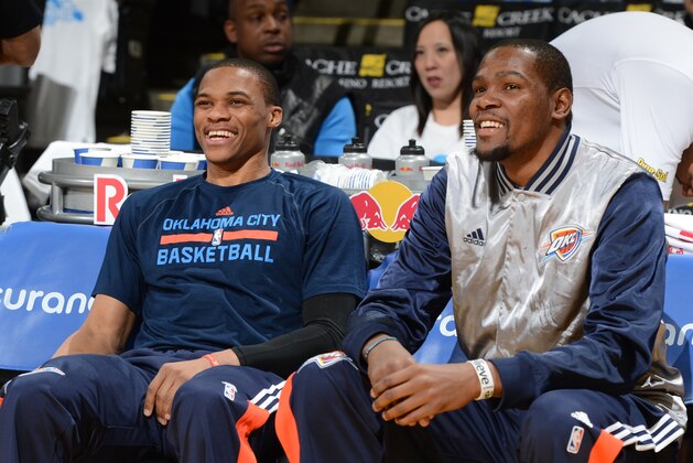 OAKLAND, CA - JANUARY 5:  Russell Westbrook #0 and Kevin Durant #35 of the Oklahoma City Thunder before the game against the Golden State Warriors on January 5, 2015 at Oracle Arena in Oakland, California. NOTE TO USER: User expressly acknowledges and agrees that, by downloading and or using this photograph, user is consenting to the terms and conditions of Getty Images License Agreement. Mandatory Copyright Notice: Copyright 2015 NBAE (Photo by Garrett Ellwood/NBAE via Getty Images)
