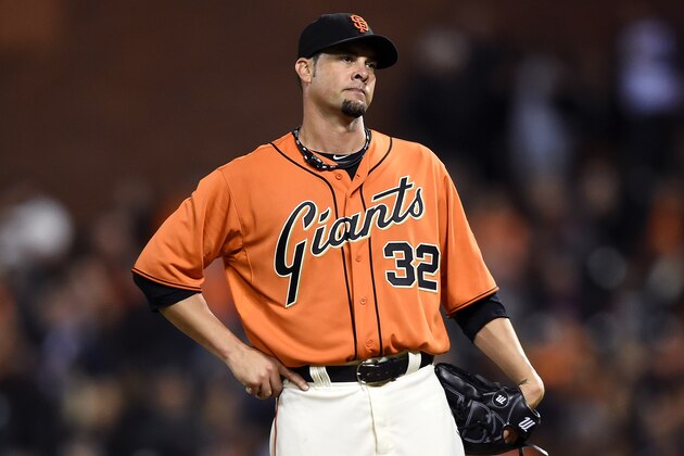 SAN FRANCISCO, CA - SEPTEMBER 26: Ryan Vogelsong #32 of the San Francisco Giants stands on the mound and looks on while he waits to be taken out of the game against the San Diego Padres in the top of the six inning at AT&T Park on September 26, 2014 in San Francisco, California. (Photo by Thearon W. Henderson/Getty Images)