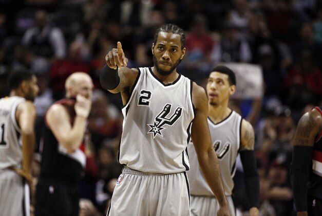 Jan 16, 2015; San Antonio, TX, USA; San Antonio Spurs small forward Kawhi Leonard (2) reacts after a shot against the Portland Trail Blazers during the second half at AT&T Center. Mandatory Credit: Soobum Im-USA TODAY Sports