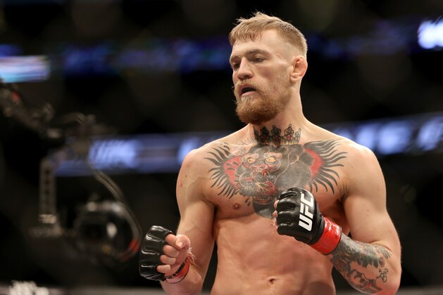 Conor McGregor in action against Denis Siver, during their featherweight fight at UFC Fight Night, Sunday, January 18, 2015 in Boston.  McGregor won via 2nd round TKO. (AP Photo/Gregory Payan)