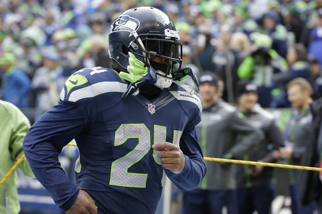 Seattle Seahawks running back Marshawn Lynch (24) takes the field before the NFL football NFC Championship game against the Green Bay Packers Sunday, Jan. 18, 2015, in Seattle. (AP Photo/Ted S. Warren)