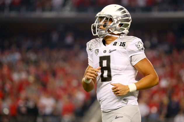 ARLINGTON, TX - JANUARY 12:  Quarterback Marcus Mariota #8 of the Oregon Ducks looks on in the first half against the Ohio State Buckeyes during the College Football Playoff National Championship Game at AT&T Stadium on January 12, 2015 in Arlington, Texas.  (Photo by Ronald Martinez/Getty Images)