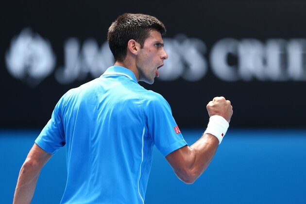 MELBOURNE, AUSTRALIA - JANUARY 20:  Novak Djokovic of Serbia celebrates a point in his first round match against Aljaz Bedene of Slovenia during day two of the 2015 Australian Open at Melbourne Park on January 20, 2015 in Melbourne, Australia.  (Photo by Cameron Spencer/Getty Images)